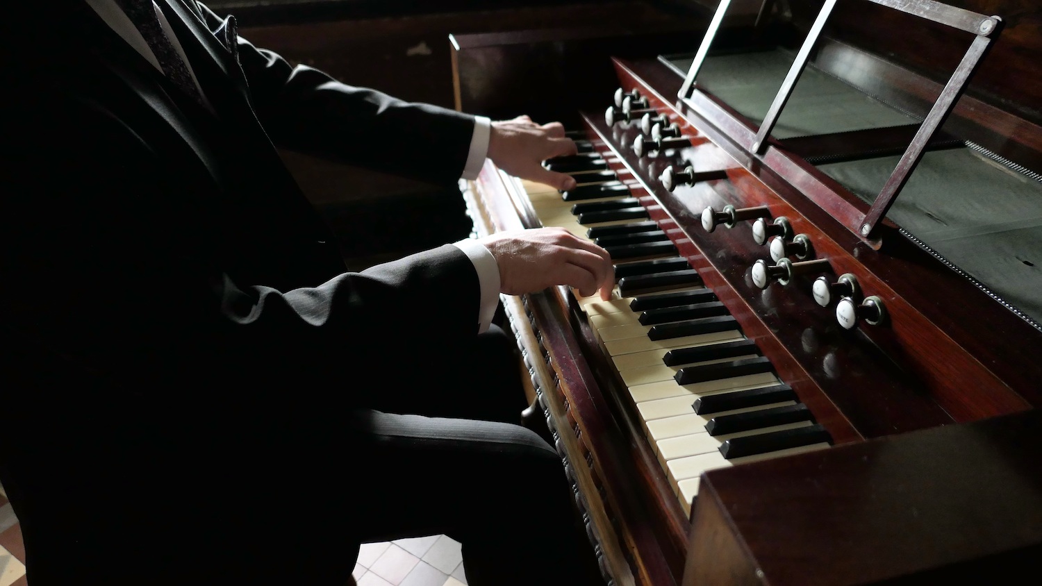 Jonathan Scott plays the harmonium