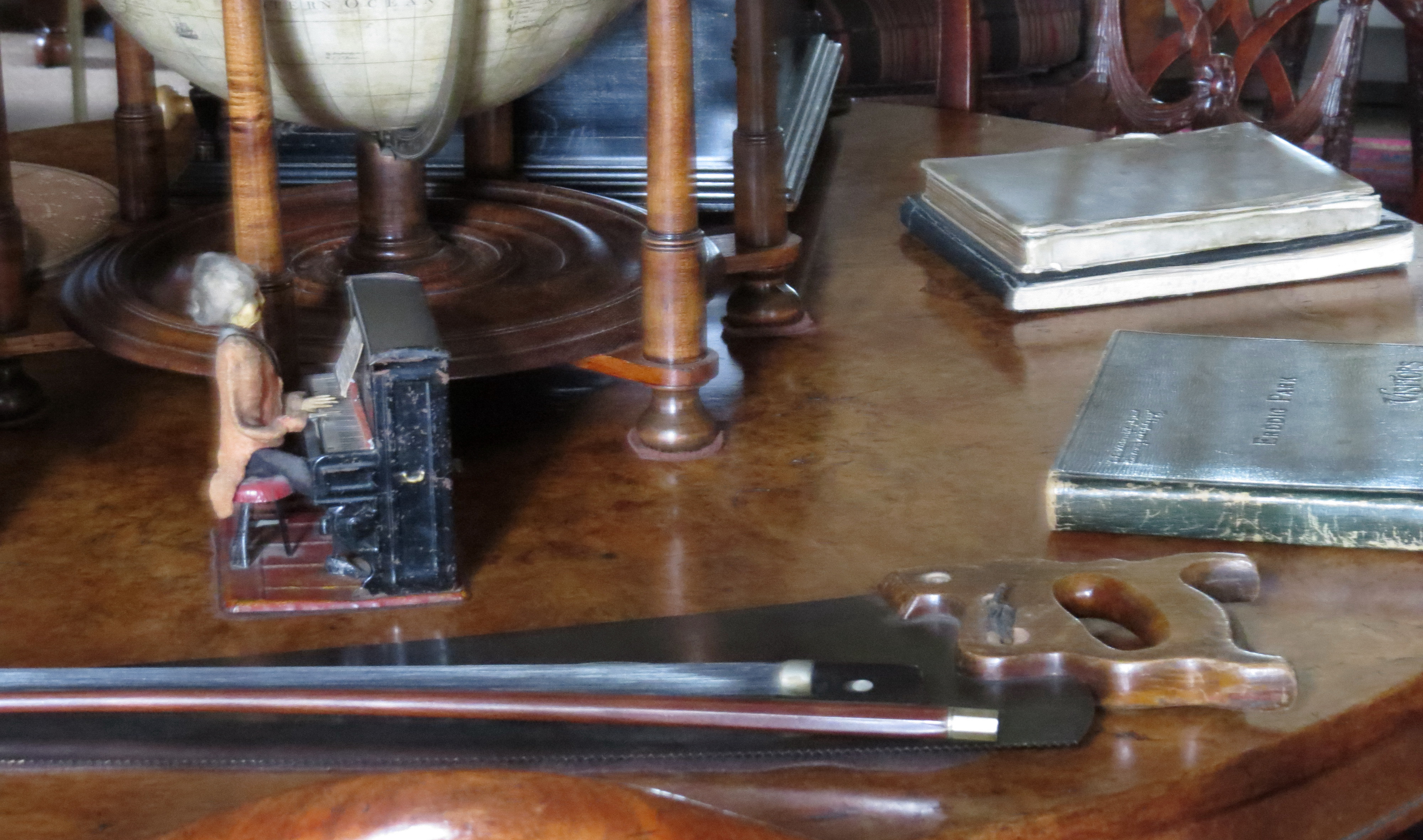 Miniature musical automaton, with musical saw in the foreground